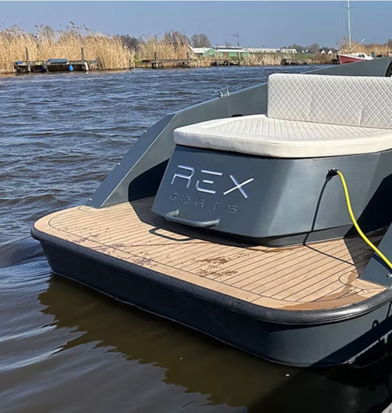 Photo: the stern of the REX Boat S1 moored on a Dutch waterway